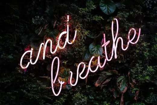 And breathe letter sign